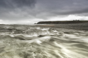 River flows into the sea at Bonmahon