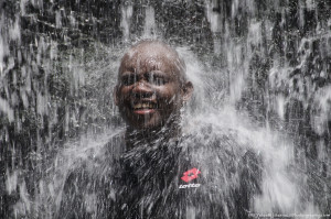 Under the waterfall